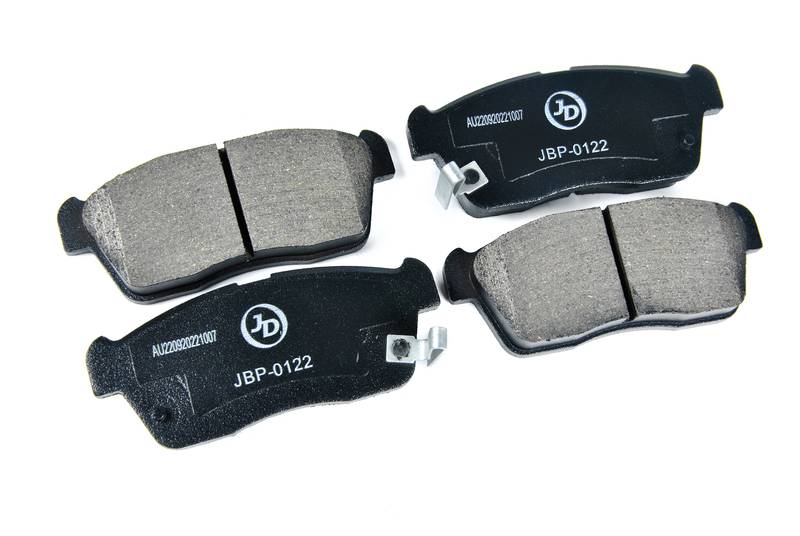 Купить запчасть JD - JBP0122 Колодки тормозные, передние D9029M SZ Swift HT51S/81S 00-, Cruze HR51S/52S/81S/82S 01-, Every Plus/Every Landy DA32W 99-; TO Duet M101A/M111A 01-04, bB QNC20/21/25 05-; DA Copen L880K 02-, Coo M401S/402S 06-, Storia M101S 01-04 M111S 98-04, YRV M201G/211G